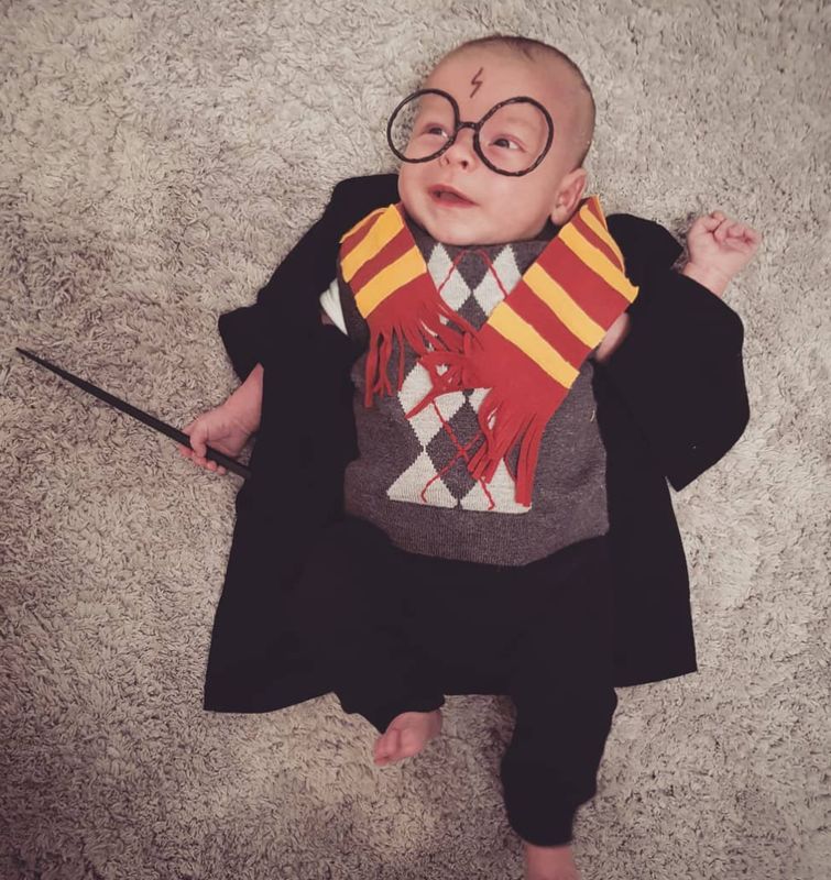 This little guy captures the magical side of Halloween in his Hogwarts get-up. The eyebrow-pencil-drawn lightning-bolt scar completes the look.