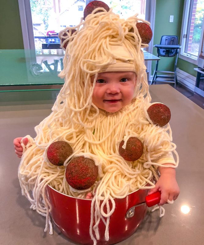 Mom made the spaghetti, Dad rustled up the meatballs. Note how very comfortable this scrumptious baby looks seated in the pot!