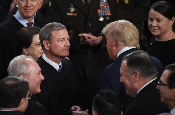 Donald Trump greets Supreme Court Chief Justice John Roberts as the president arrives to deliver the State of the Union address on Feb. 4, 2020. Trump's promise to name conservative judges secured his support from Republican leaders in 2016.