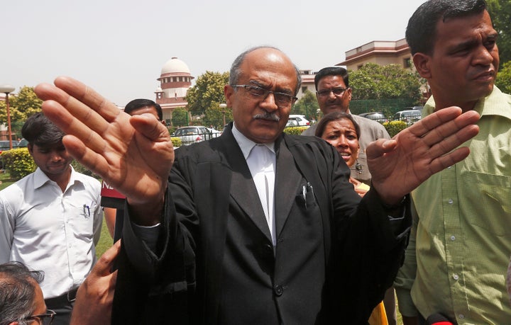 Prashant Bhushan, a senior lawyer, speaks with the media in New Delhi.