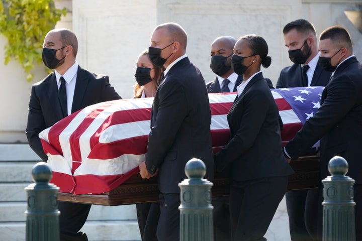 The flag-draped casket of Justice Ruth Bader Ginsburg arrives at the Supreme Court in Washington, Wednesday, Sept. 23, 2020. Ginsburg, 87, died of cancer on Sept. 18. (AP Photo/J. Scott Applewhite)