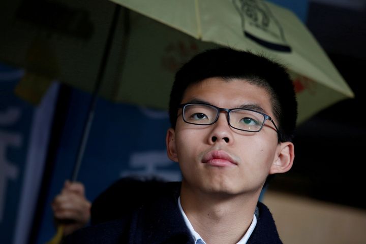 Former student leader Joshua Wong reacts outside High Court before receiving his sentence in Hong Kong, China January 17, 2018. REUTERS/Bobby Yip TPX IMAGES OF THE DAY