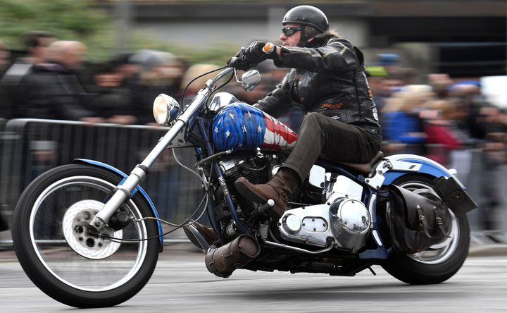A biker rides his Harley-Davidson during a parade at the "Hamburg Harley Days" in Hamburg, Germany, June 24, 2018. REUTERS/Fabian Bimmer