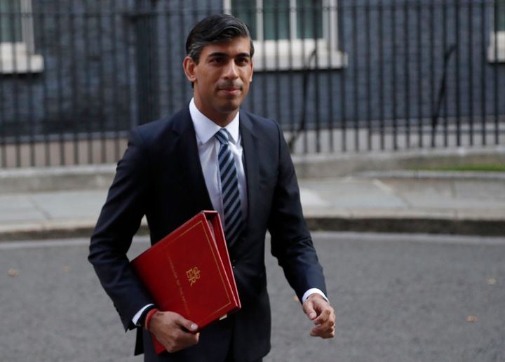 Chancellor of the Exchequer Rishi Sunak walks across Downing Street