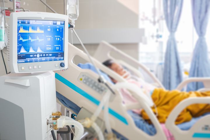Generic photo of a hospital patient in a mechanical ventilation bed