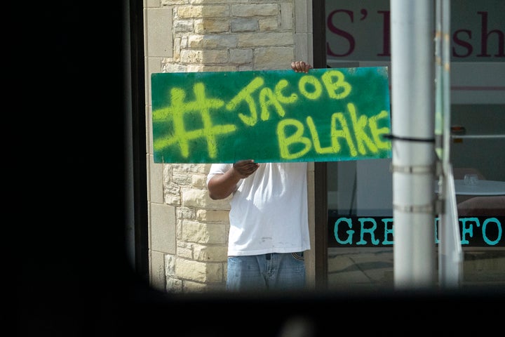 As Democratic nominee Joe Biden's motorcade made its way through Kenosha, Wisconsin, earlier this month, an onlooker held up