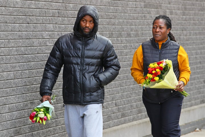 Floral tributes are being left at the scene of the shooting 