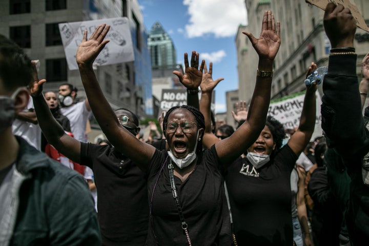 Protesters march against police brutality and racism in Montreal, just over a week after George Floyd's death.