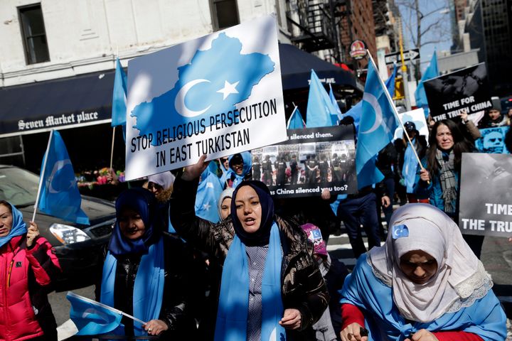 Uighurs and their supporters march to the Permanent Mission of China to the United Nations in New York, Thursday, March 15, 2018. 
