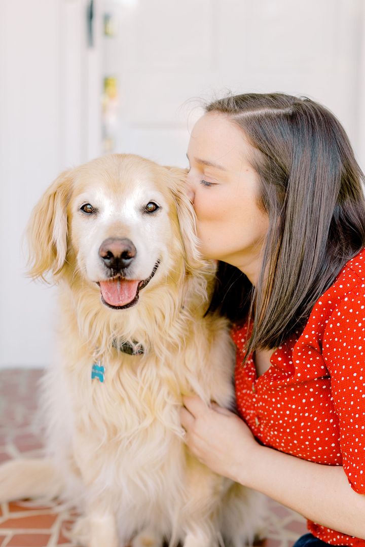 Sallie Gregory-Hammett giving her favorite doggo a kiss.