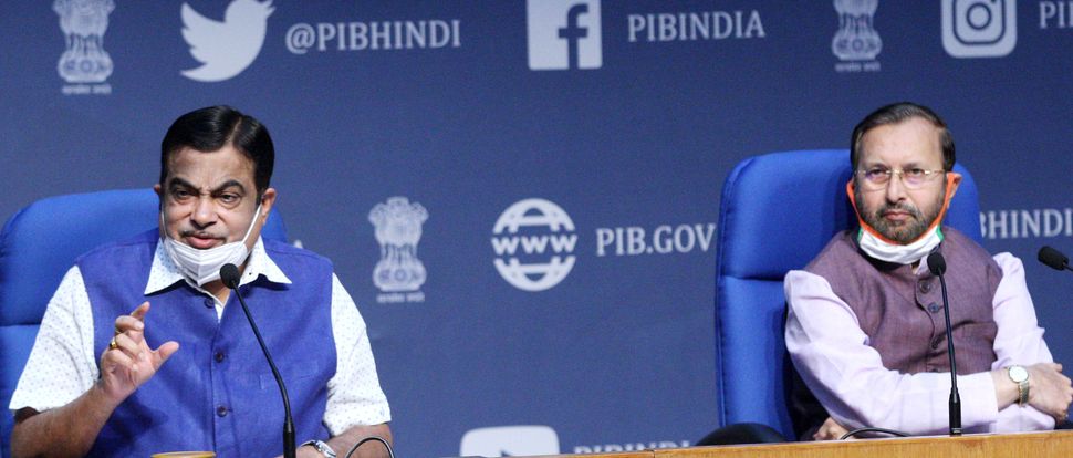 Minister for Environment, Forest and Climate Change, Prakash Javadekar (right) and Minister for Road Transport and Highways Nitin Gadkari (right) addresses media after a cabinet meeting in New Delhi. 