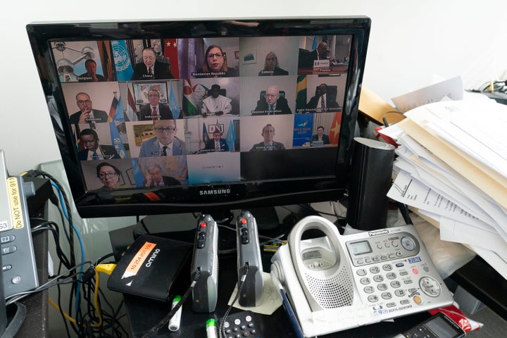 United Nations Secretary-General Antonio Guterres, second from right bottom, seen on a computer monitor at United Nations headquarters during the 75th session of the United Nations General Assembly, Thursday, Sept. 24, 2020. (AP Photo/Mary Altaffer)