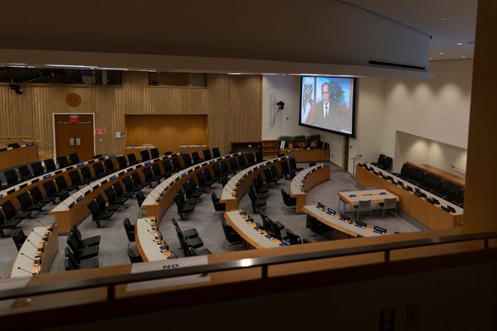 Lebanese President Michel Naim Aoun is seen on a video screen in an empty conference room remotely addressing the 75th session of the United Nations General Assembly, Wednesday, Sept. 23, 2020, at U.N. headquarters. (AP Photo/Mary Altaffer)