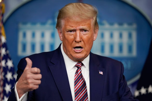 President Donald Trump gestures while speakings during a news conference at the White House, Sunday, Sept. 27, 2020, in Washington. 