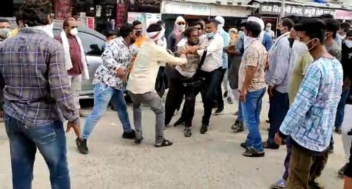 A mob led by local Congress leaders and workers assaulting journalist Kamal Shukla in Kanker district of Chhattisgarh on September 26