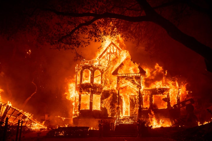 Flames from the Glass Fire consume the Glass Mountain Inn, late Sunday, Sept. 27, 2020, in St. Helena, Calif. (AP Photo/Noah Berger)