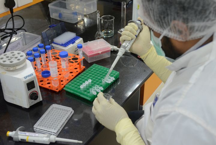 A research scientist works inside a laboratory of India's Serum Institute, the world's largest maker of vaccines, which is working on vaccines against the coronavirus disease (COVID-19) in Pune, May 18, 2020. 