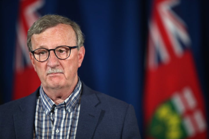 Dr. David Williams, Ontario's chief medical officer of health, listens during a press conference in Toronto on June 23, 2020. 