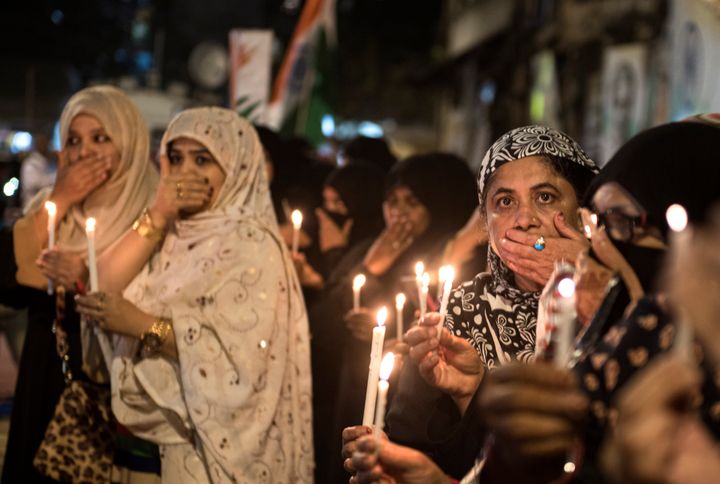 Muslim women protest at a candlelight vigil against Delhi riots at Mumbai Bagh on February 27, 2020 in Mumbai, India. 