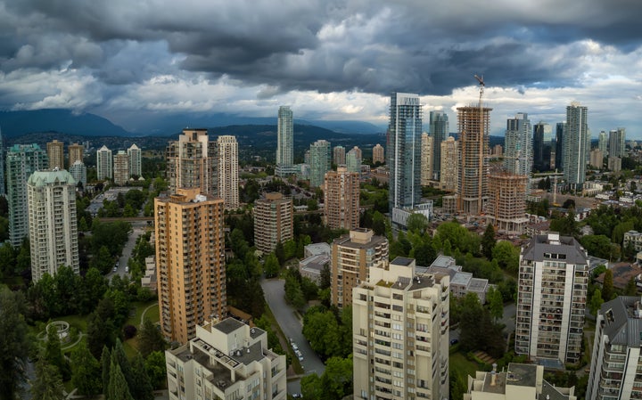 An aerial view of condo towers in the Greater Vancouver neighbourhood of Metrotown. Canada's house prices will keep rising, according to a new forecast from Capital Economics -- but condos might be a different story.