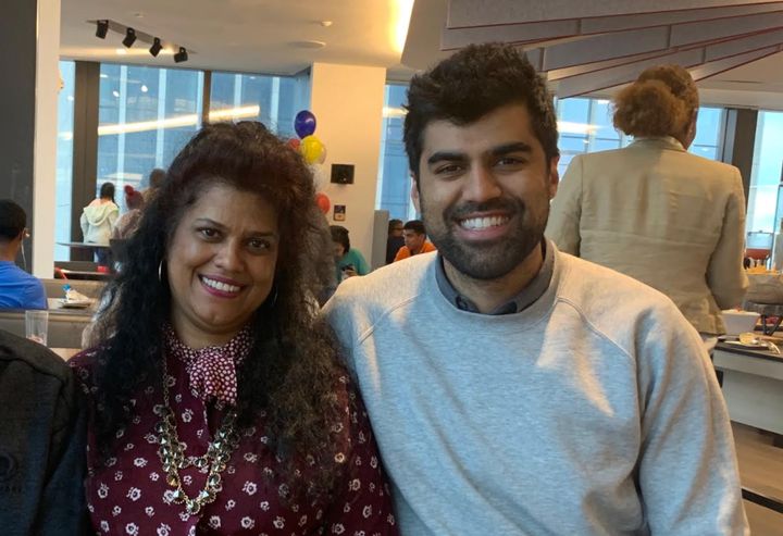 The author with his mom at a family day at the law firm where he worked in New York City in 2019. 