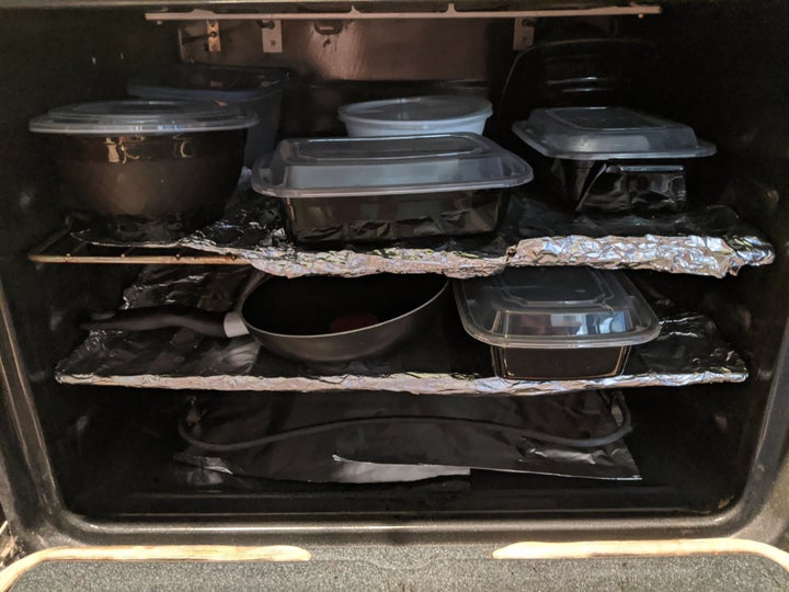 The writer doesn't use her oven at all, except for storing food containers.