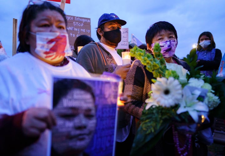 Joyce Echaquan's husband Carol Dubé and her mother Diane Echaquan Dubé (right) took part in a candlelight vigil in front of the Joliette hospital where she died, Tuesday evening.