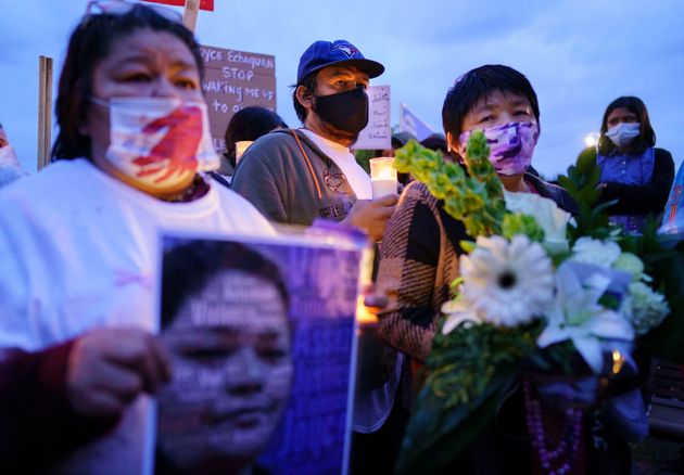 Joyce Echaquan's husband Carol Dubé and her mother Diane Echaquan Dubé (right) took part in a candlelight vigil in front of the Joliette hospital where she died, Tuesday evening.