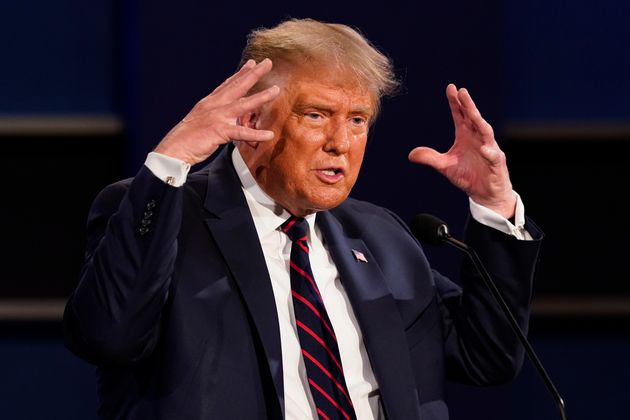 President Donald Trump gestures while speaking during the first presidential debate Tuesday, Sept. 29,...