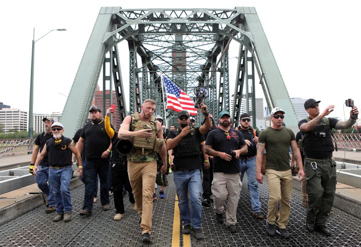 Members of the Proud Boys and their supporters march during a rally in Portland, Oregon last month.