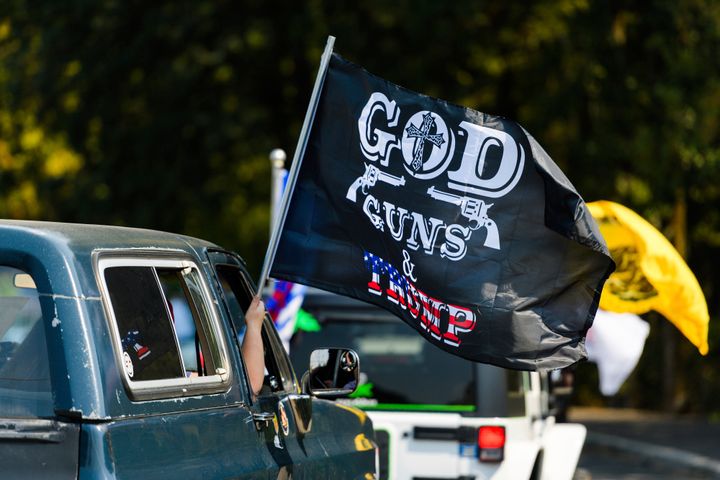 The "Oregon for Trump 2020 Labor Day Cruise Rally" is held at Clackamas Community College in Oregon City, Ore., Monday, Sept. 7, 2020. (AP Photo/Michael Arellano)