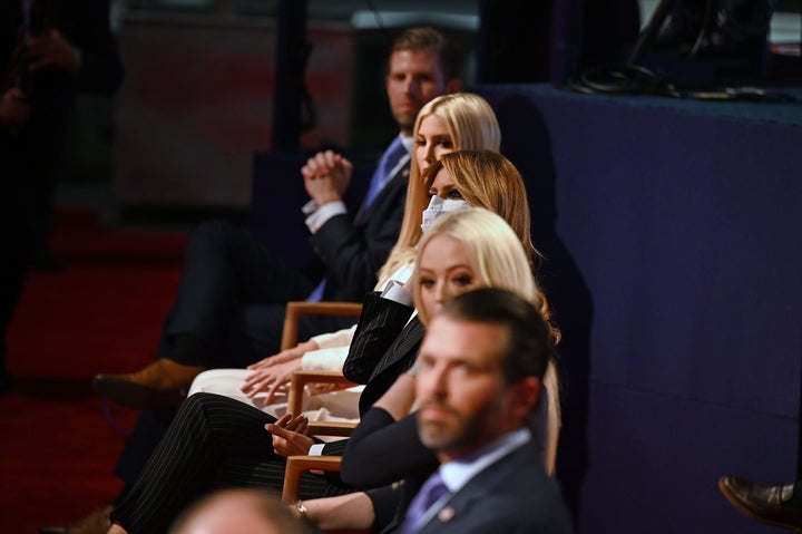 Members of the Trump family seen not wearing masks during the first presidential debate. Only first lady Melania Trump is wearing one.