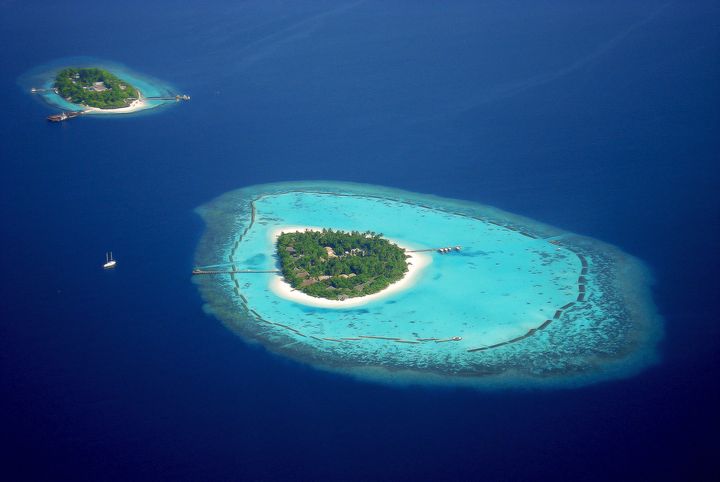 Aerial view of two islands in Maldives.