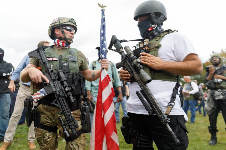 Heavily armed members of the far-right Proud Boys gang gather with their allies in Portland, Oregon, on Sept. 26.