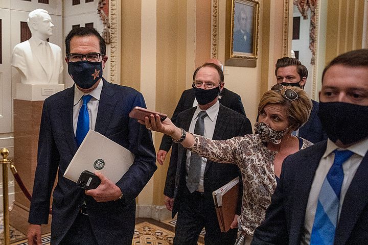 Treasury Secretary Steven Mnuchin departs from the office of Senate Majority Leader Mitch McConnell at the U.S. Capitol on Wednesday. Mnuchin met with Democrats and Republicans about coronavirus relief legislation.