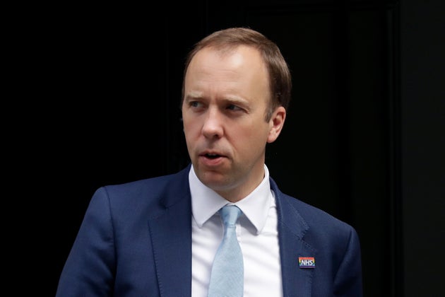 British Health Secretary Matt Hancock walks to 10 Downing Street in London, Wednesday, Sept. 16, 2020. (AP Photo/Matt Dunham)