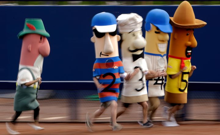 These are the sausage mascots that the Wisconsin GOP wants to keep away from polling sites.