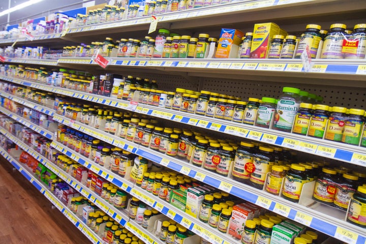 Supplements for sale at a grocery store.