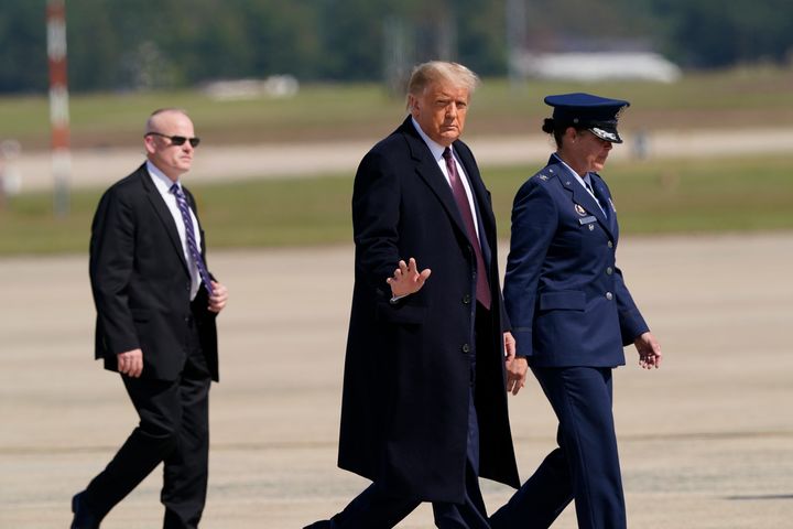 Trump walks from Marine One toward Air Force One at Andrews Air Force Base in Maryland on Thursday.