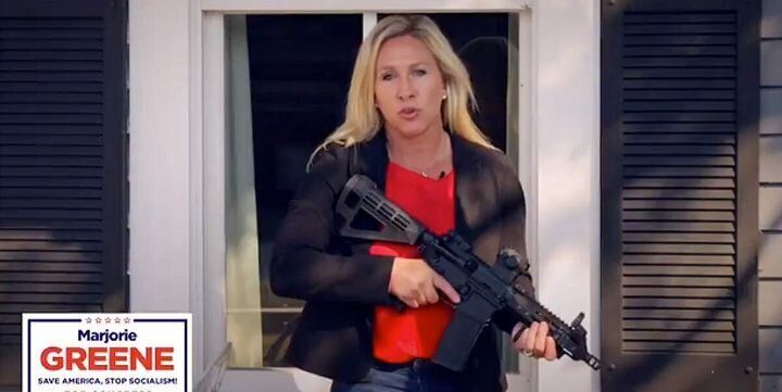 Republican congressional candidate and QAnon conspiracy cultist Marjorie Taylor Greene brandishes an AR-15 assault rifle while defending property against antifa activists who never appeared.