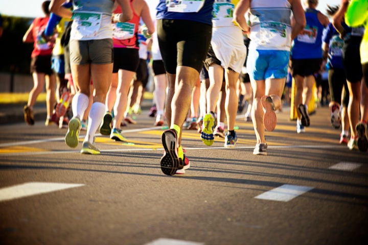 Marathon runners with back to camera