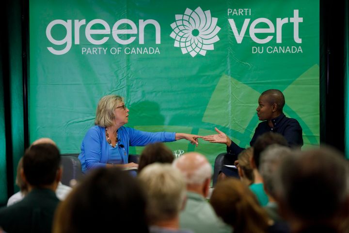 Green Party of Canada leader Elizabeth May, left, speaks with Toronto area leadership candidate Annamie Paul during a fireside chat about the climate, in Toronto, Tuesday, Sept. 3, 2019. 