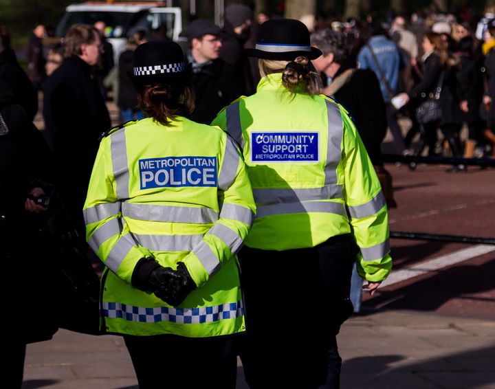 Stock image of two Metropolitan police officers in London.