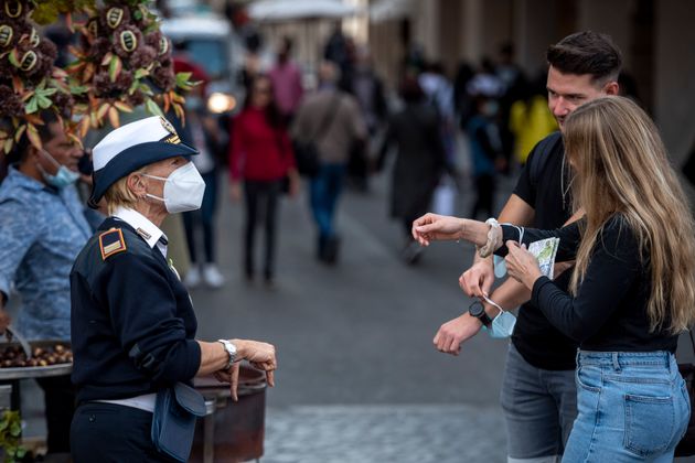 ROME, ITALY - OCTOBER 02: Municipal police officers invite people to wear protective masks amid Covid-19 ...