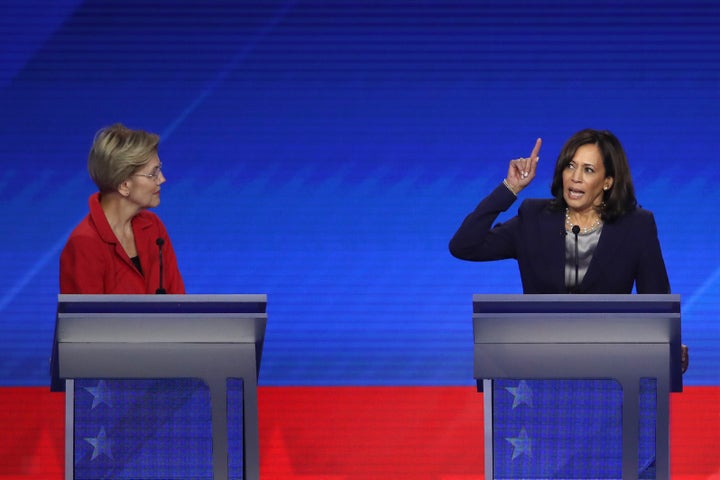 Sen. Elizabeth Warren looks on as Harris speaks during the Democratic Presidential Debate on Sept. 12, 2019, in Houston, Texas.