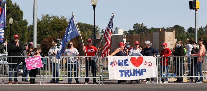 Trump supporters gathered outside Walter Reed National Military Medical Center on Sunday to show their support for President Donald Trump.