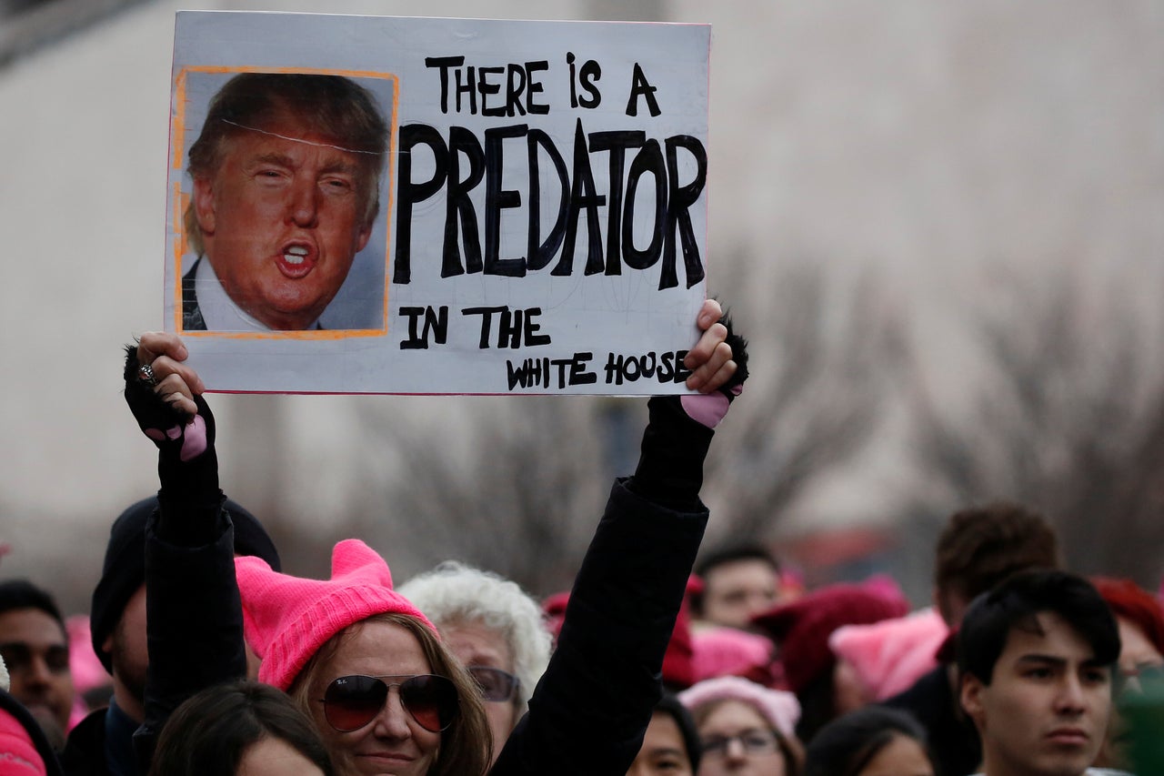 Throngs of people, many wearing pink "pussy hats," joined the Women's March in Washington on January 21, 2017.