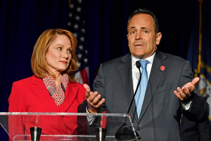 Then-Gov. of Kentucky Matt Bevin (R) speaks to supporters in Lousiville as wife Glenna looks on as the vote on election