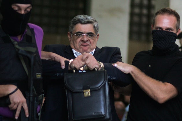 Φωτογραφεία αρχείο από την ημέρα της σύλληψης του Νίκου Μιχαλολιάκου, ηγέτη της Χρυσής Αυγής.