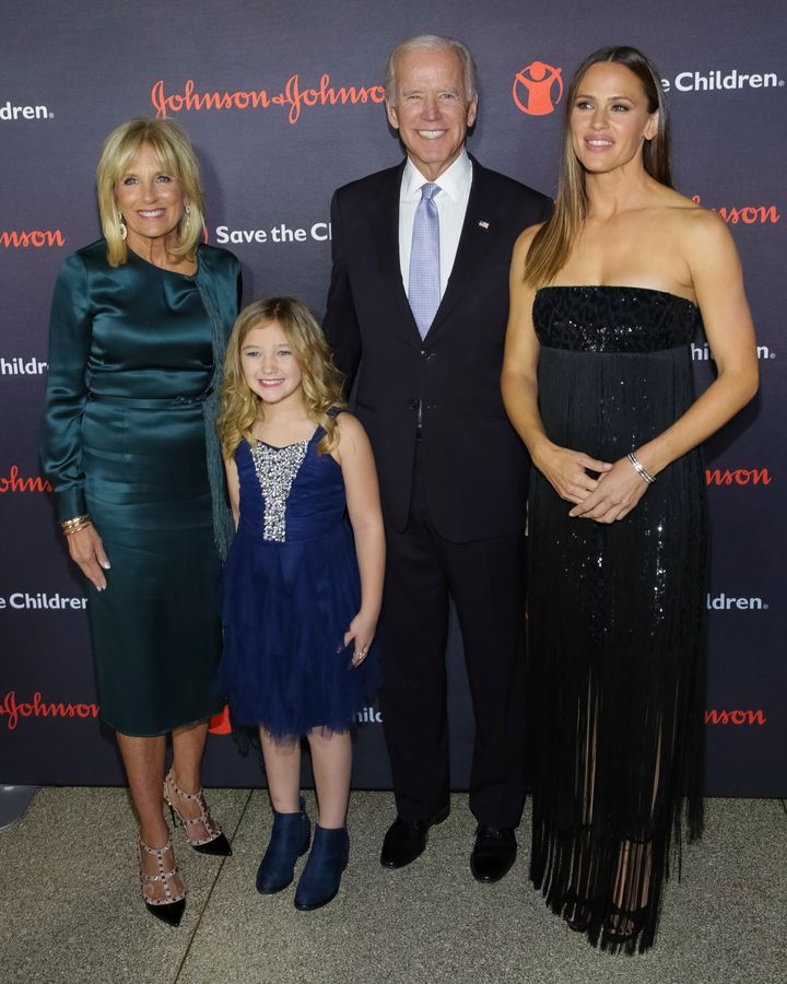 Garner pictured at a Save The Children event with the Bidens in 2017. 